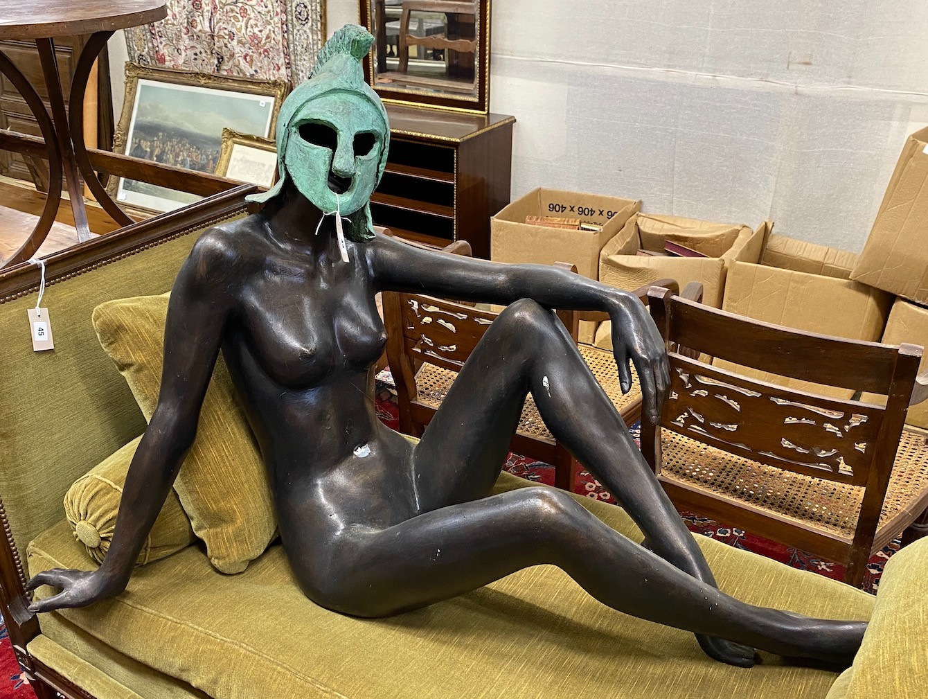 A bronzed resin sculpture of a female Greek warrior, height 90cm